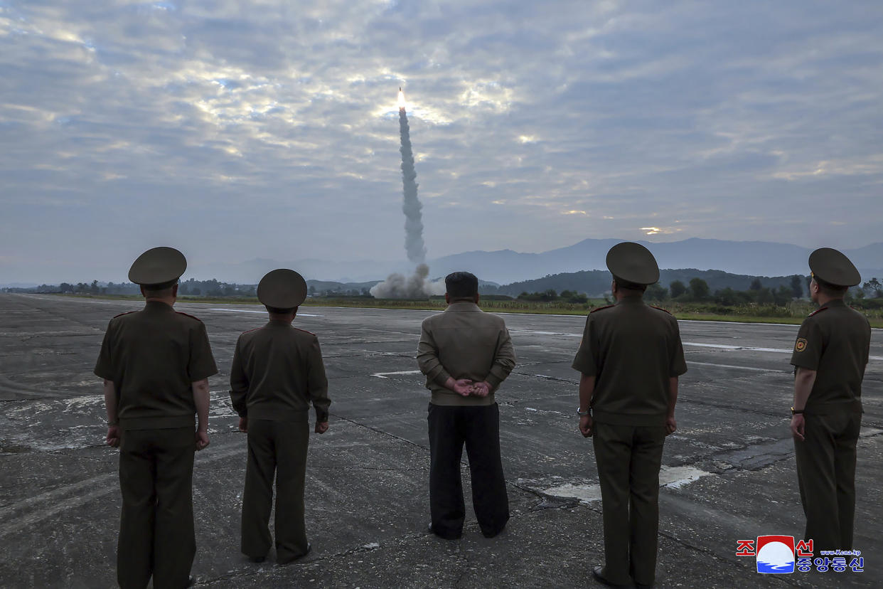 In this photo provided by the North Korean government, North Korean leader Kim Jong Un, center, oversees a launch of, what it says, the country’s newly built Hwasongpho-11-Da-4.5 ballistic missile at an undisclosed place in North Korea Wednesday, Sept. 18, 2024. Independent journalists were not given access to cover the event depicted in this image distributed by the North Korean government. The content of this image is as provided and cannot be independently verified. Korean language watermark on image as provided by source reads: "KCNA" which is the abbreviation for Korean Central News Agency. (Korean Central News Agency/Korea News Service via AP)