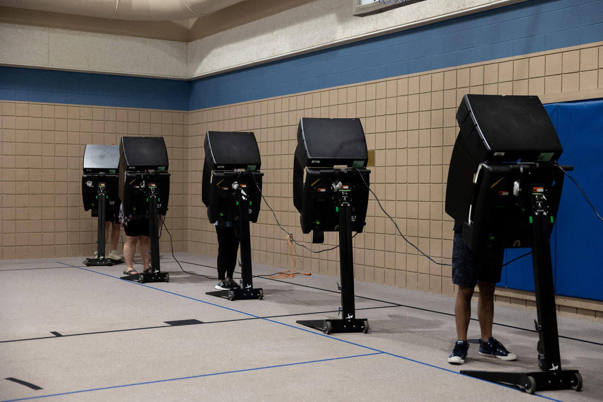 Voters cast their ballots at the Covenant Presbyterian Church in Wichita, Kan., on Aug. 2, 2022.