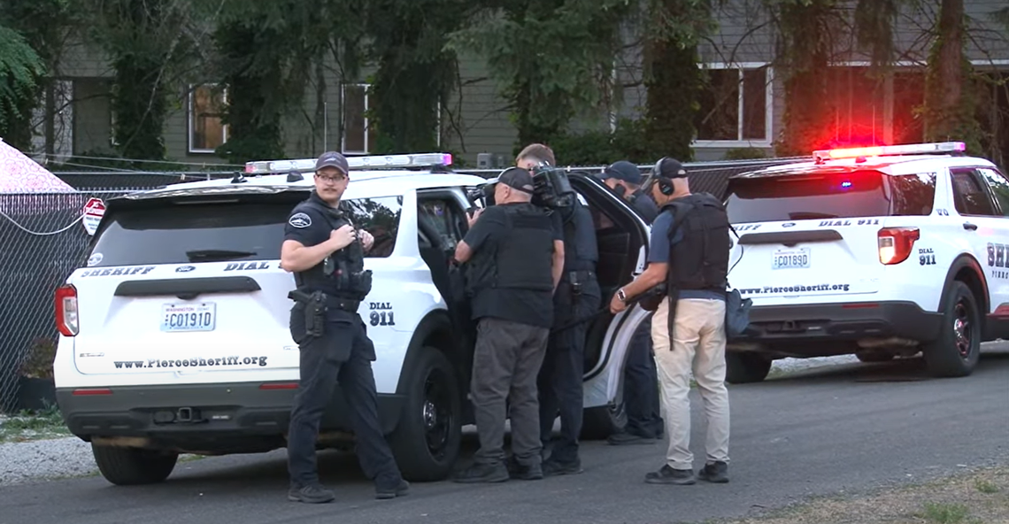 Producers from the reality-TV show “Cops” film at the scene of an incident July 16, 2024 in Pierce County after Sheriff’s Department deputies pursued and detained a suspect.