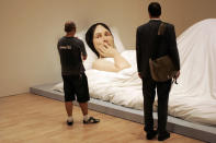 An exhibition piece entitled "In Bed" is seen ahead of the opening of the new Ron Mueck exhibition at the National Gallery of Victoria on January 21, 2010 in Melbourne, Australia. The exhibition will feature 12 of Mueck's hyper-realistic sculptures from the Scottish Gallery of Modern Art, along with 4 new works. (Photo by Raoul Wegat/Getty Images)