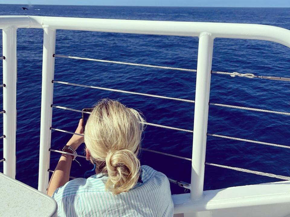 Hawaii - The author on the lookout for humpbacks while whale watching in Maui, Hawaii, with the Pacific Whale Foundation