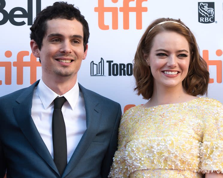 Director Damien Chazelle and Emma Stone attend the premiere of 