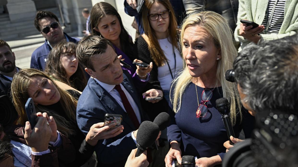 Rep. Marjorie Taylor Greene speaks to the media after the House of Representatives passed bills for aid to Ukraine and Israel on April 20, 2024.