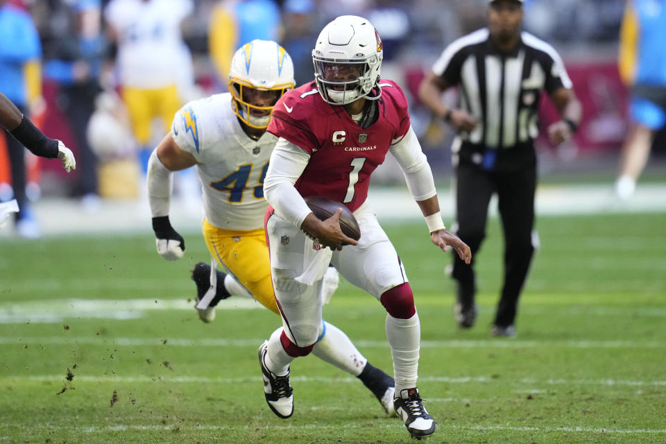 Arizona Cardinals quarterback Kyler Murray (1) scrambles against the Los Angeles Chargers during the first half of an NFL football game, Sunday, Nov. 27, 2022, in Glendale, Ariz. (AP Photo/Ross D. Franklin)