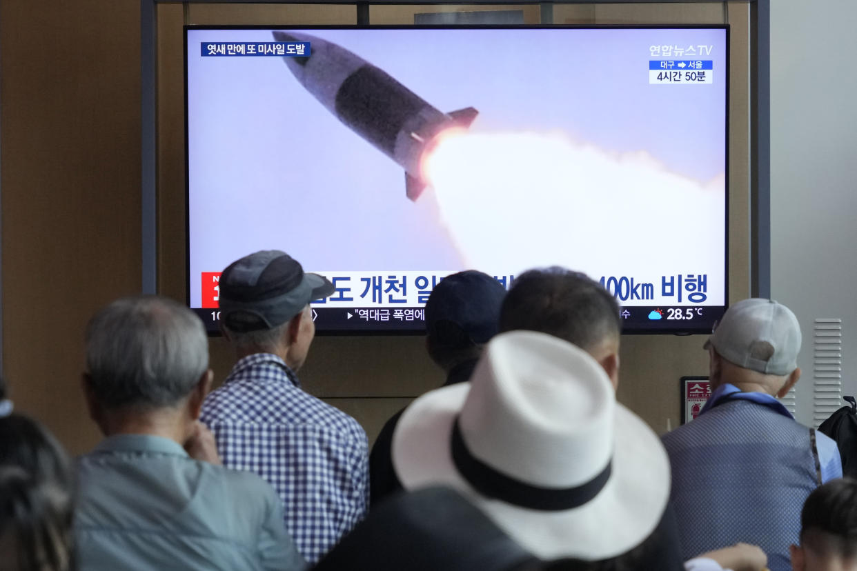 A TV screen shows a file image of North Korea's missile launch during a news program at Seoul Railway Station in Seoul, South Korea, Wednesday, Sept. 18, 2024. (AP Photo/Ahn Young-joon)