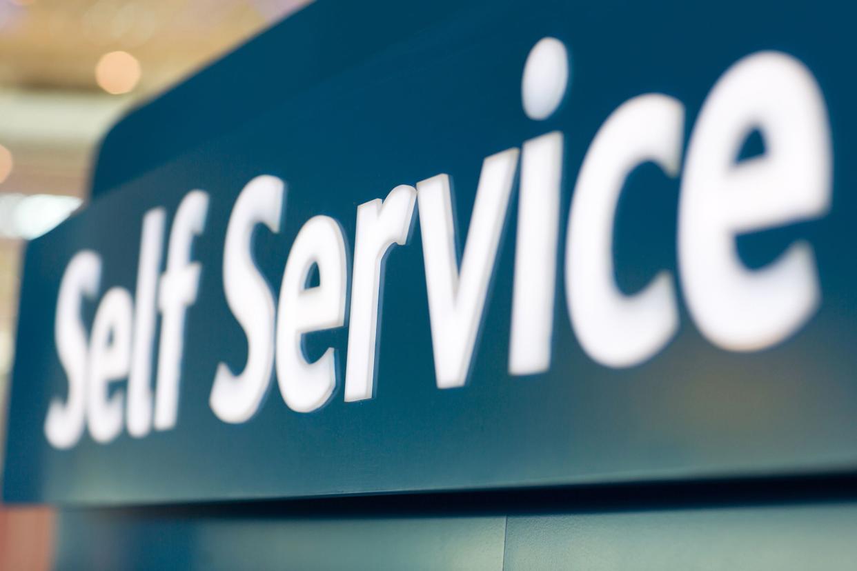close up of 'Self service' sign