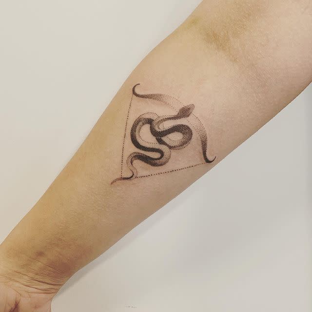 12) This Sagittarius Snake and Bow Tattoo