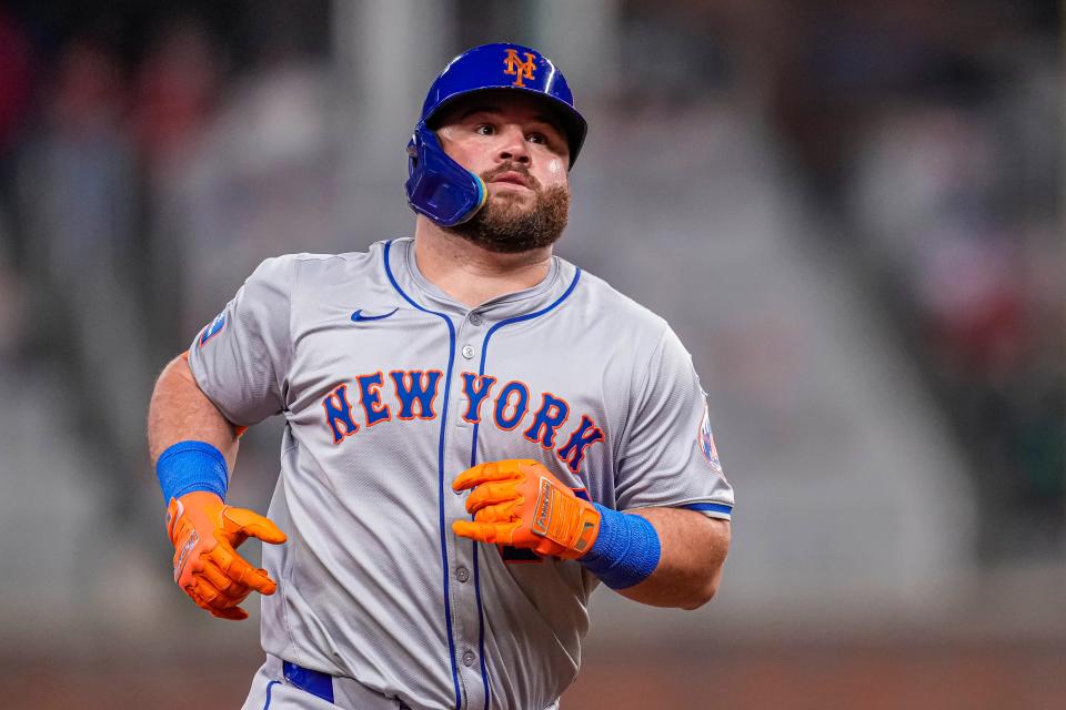 New York Mets designated hitter DJ Stewart (29) runs after hitting a home run against the Atlanta Braves during the eighth inning on April 8, 2024, at Truist Park.