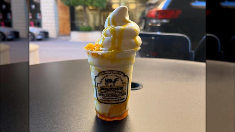 Soft serve with mango syrup