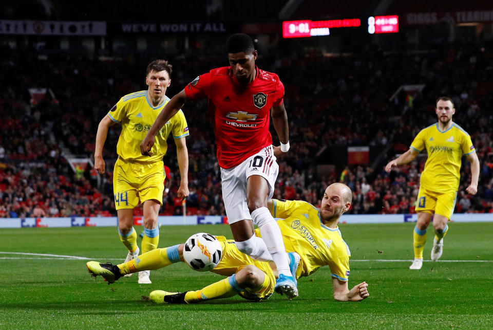 Soccer Football - Europa League - Group L - Manchester United v Astana - Old Trafford, Manchester, Britain - September 19, 2019  Manchester United's Marcus Rashford in action with Astana's Ivan Maevski   Action Images via Reuters/Jason Cairnduff