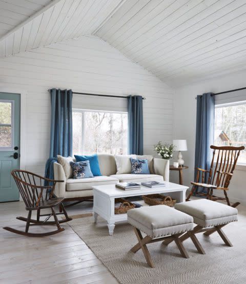 <p>To make tight quarters—such as the Robinson's living room—have more continuity, use one accent color throughout the house. Amanda chose a cool, icy blue.</p>