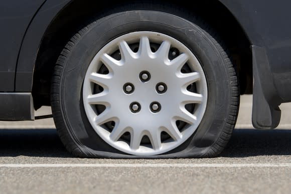 A flat tire on a car