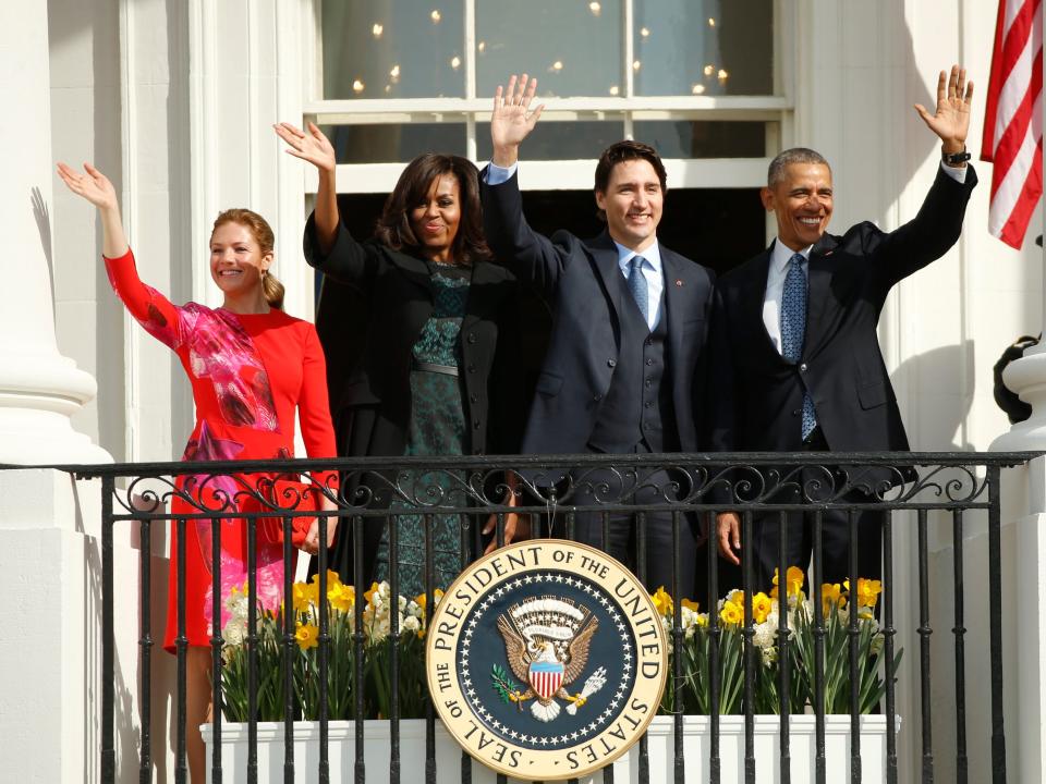 U.S. President Barack Obama (R), Canadian Prime Minister Justin Trudeau, U.S. first lady Michelle Obama and Sophie Gregoire Trudeau (L) pose from a balcony as they take part in an arrival ceremony for the Trudeaus at the White House in Washington March 10, 2016