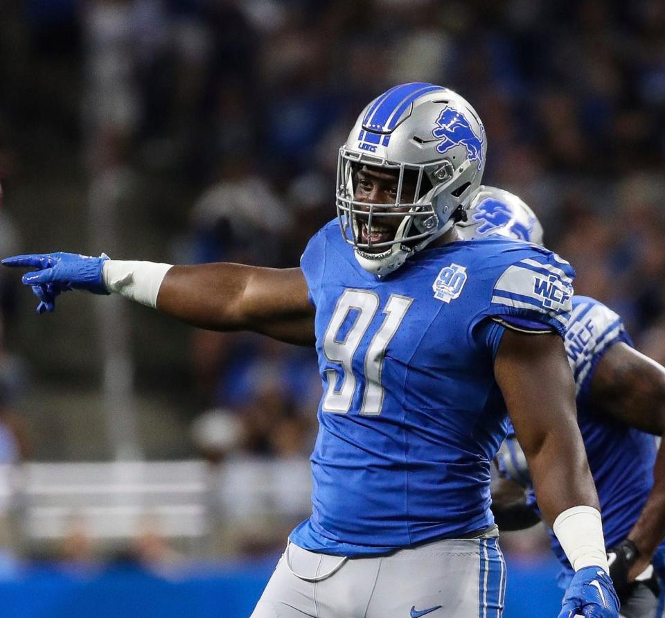 Detroit Lions defensive end Levi Onwuzurike (91) celebrates a tackle against the <a class="link " href="https://sports.yahoo.com/nfl/teams/ny-giants/" data-i13n="sec:content-canvas;subsec:anchor_text;elm:context_link" data-ylk="slk:New York Giants;sec:content-canvas;subsec:anchor_text;elm:context_link;itc:0">New York Giants</a> during the first half of a preseason game at Ford Field in Detroit on Friday, Aug. 11, 2023.