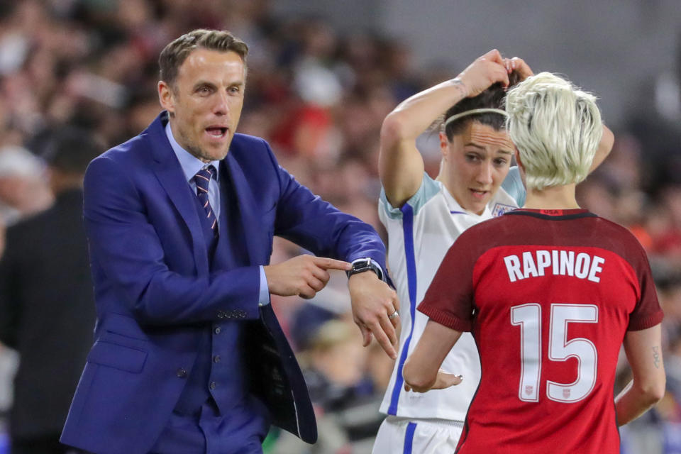 ORLANDO, FL - MARCH 07: England Head Coach Phil Neville talks with United States forward Megan Rapinoe (15) during the SheBelieves Cup soccer match between England and The United States  on March 7, 2018 at Orlando City Stadium in Orlando FL. (Photo by Joe Petro/Icon Sportswire via Getty Images)