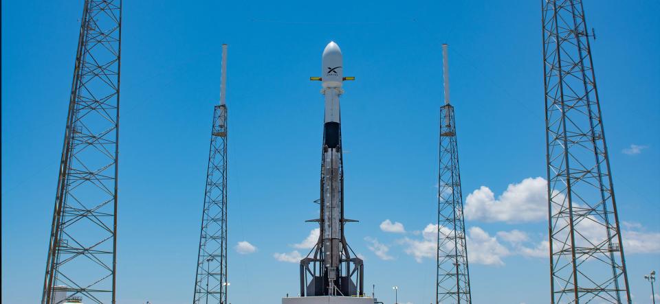 A SpaceX Falcon 9 rocket stands at Cape Canaveral Space Force Station's Launch Complex 40 ahead of a Starlink mission to boost the internet-beaming satellites to orbit.