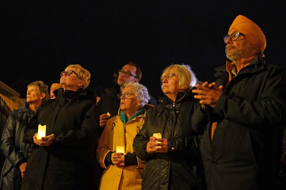 People attend a candle-lit vigil of solidarity for peace in the Middle East, at Canterbury Cathedral (Gareth Fuller/PA) (PA Wire)