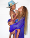 <p>Expectant mom Beyoncé wore a royal blue coverup over her matching bikini as she held 5-year-old Blue Ivy, sporting a blue hat. I’m sensing a theme. (Photo: <a rel="nofollow noopener" href="https://www.instagram.com/p/BUtPRfzg3-e/?taken-by=beyonce" target="_blank" data-ylk="slk:Beyoncé via Instagram;elm:context_link;itc:0;sec:content-canvas" class="link ">Beyoncé via Instagram</a>) </p>