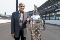 FILE - Four-time winner of the Indianapolis 500, Al Unser, poses with the Borg-Warner Trophy at the Indianapolis Motor Speedway in Indianapolis, Tuesday, July 20, 2021. Winner of this year's Indy 500, Helio Castroneves, gathered with other four-time winners A.J. Foyt (1961, 1964, 1967, 1977), Al Unser (1970, 1971, 1978, 1987) and Rick Mears (1979, 1984, 1988, 1991) at the track. Castroneves won the race in 2001, 2002, 2009 and 2021. Unser, one of only four drivers to win the Indianapolis 500 a record four times, died Thursday, Dec. 9, 2021, following years of health issues. He was 82. (AP Photo/Doug McSchooler, File)