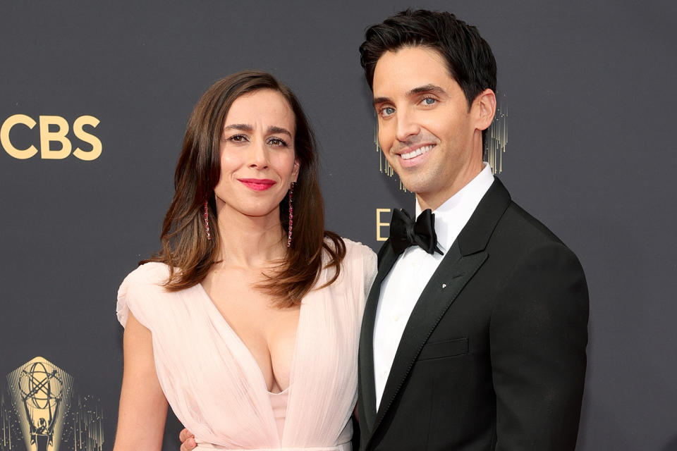 <p>The <em>Hacks</em> co-creators — and newly minted Emmy winners — <a href="https://people.com/tv/2021-emmy-awards-hacks-co-creators-lucia-aniello-and-paul-w-downs-are-married/" rel="nofollow noopener" target="_blank" data-ylk="slk:tied the knot;elm:context_link;itc:0;sec:content-canvas" class="link ">tied the knot</a> in Italy recently.</p> <p>Hannah Einbinder, an actress on the show, shared the happy news with <a href="https://www.vanityfair.com/style/2021/09/hannah-einbinder-prada-emmys-2021" rel="nofollow noopener" target="_blank" data-ylk="slk:Vanity Fair;elm:context_link;itc:0;sec:content-canvas" class="link "><em>Vanity Fair</em></a> ahead of the 73rd Primetime <a href="https://people.com/tag/emmy-awards/" rel="nofollow noopener" target="_blank" data-ylk="slk:Emmy Awards;elm:context_link;itc:0;sec:content-canvas" class="link ">Emmy Awards</a><em>. </em>She noted that she traveled to the wedding, as the cast and crew had grown close during filming.</p> <p>In accepting her Emmy for outstanding directing for a comedy series, Aniello gushed to her new husband: "I'm in love with you, which is why I married you last weekend!"</p> <p>The couple previously told <a href="https://www.hollywoodreporter.com/tv/tv-news/hacks-co-creators-lucia-aniello-paul-w-downs-relationship-emmys-1234998655/" rel="nofollow noopener" target="_blank" data-ylk="slk:The Hollywood Reporter;elm:context_link;itc:0;sec:content-canvas" class="link "><em>The Hollywood Reporter</em></a> that they first met in 2007, in an improv class at the Upright Citizens Brigade. </p>