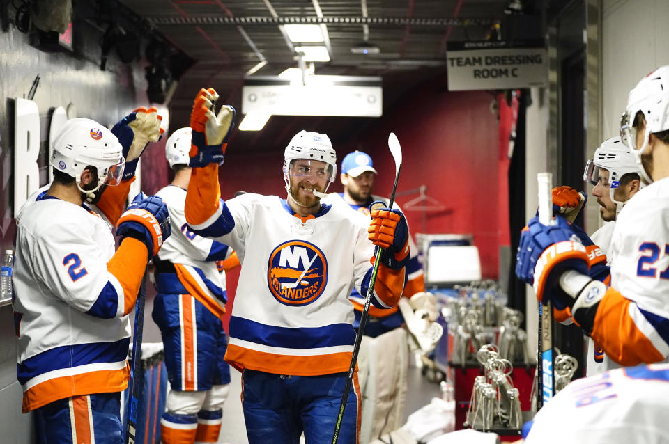 TORONTO, ONTARIO - SEPTEMBER 05: Devon Toews #25 of the New York Islanders greets teammates before taking the ice to play against the Philadelphia Flyers in the second period of Game Seven of the Eastern Conference Second Round of the 2020 NHL Stanley Cup Playoffs at Scotiabank Arena on September 05, 2020 in Toronto, Ontario. (Photo by Mark Blinch/NHLI via Getty Images)