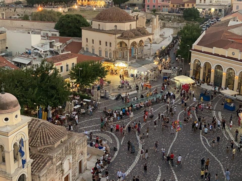 people milling about in monastiraki in greece