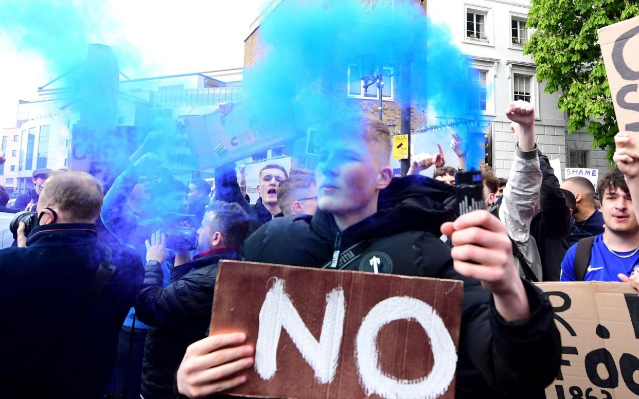 Fans protest against Chelsea's involvement in the new European Super League outside Stamford Bridge, London - Ian West/PA Wire