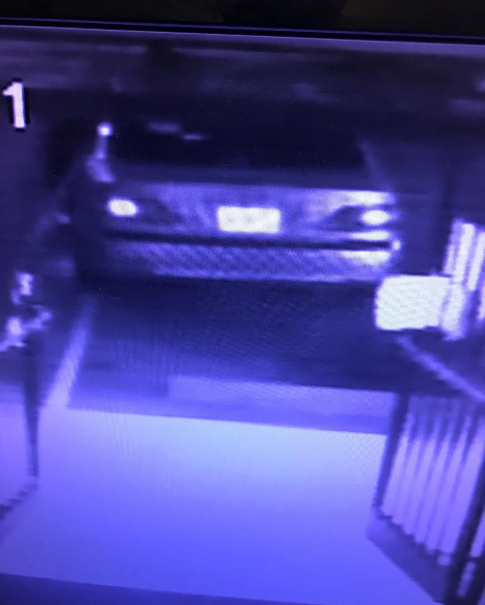 Asheville police say a suspect driving a silver car, seen here in surveillance footage, broke into a South Asheville gun shop Jan. 7 and stole more than 30 guns.