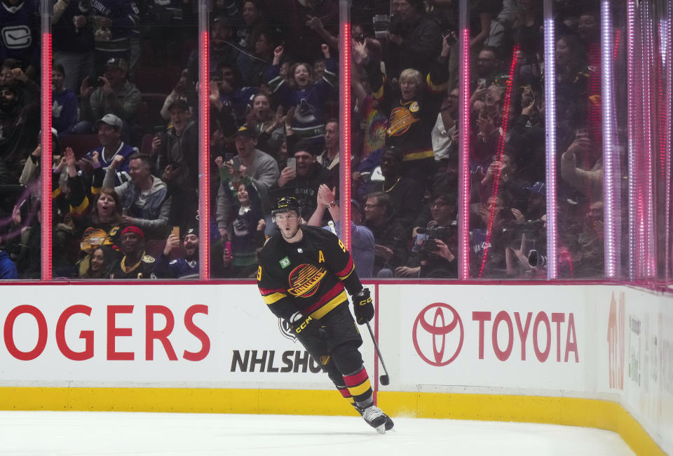 Vancouver Canucks' J.T. Miller celebrates his penalty-shot goal against the Vegas Golden Knights during the second period of an NHL hockey game Tuesday, March 21, 2023, in Vancouver, British Columbia. (Darryl Dyck/The Canadian Press via AP)