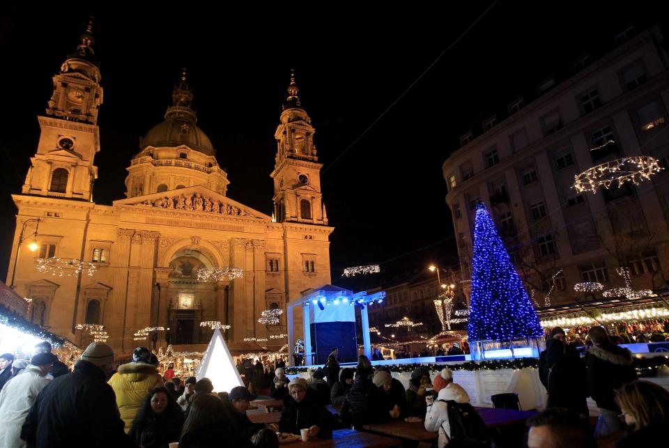 St. Stephens' Basilica is pictured behind a Christmas market in downtown Budapest