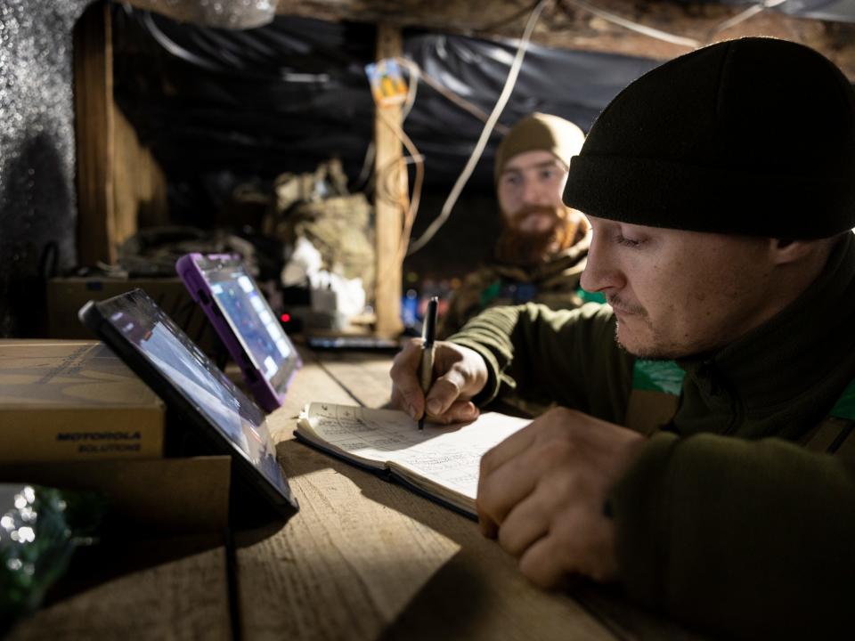 Ukrainian soldiers take shelter in a bunker while awaiting orders to fire a British-made L118 105mm Howitzers on Russian trenches on March 04, 2023 near Bakhmut, Ukraine.