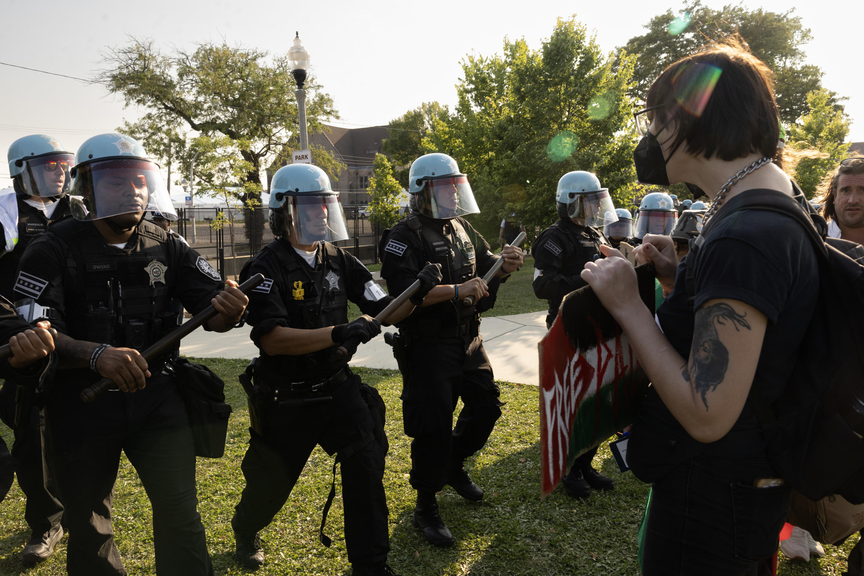 Police attempt to clear a park near the United Center in Chicago on Monday. (Scott Olson/Getty Images)