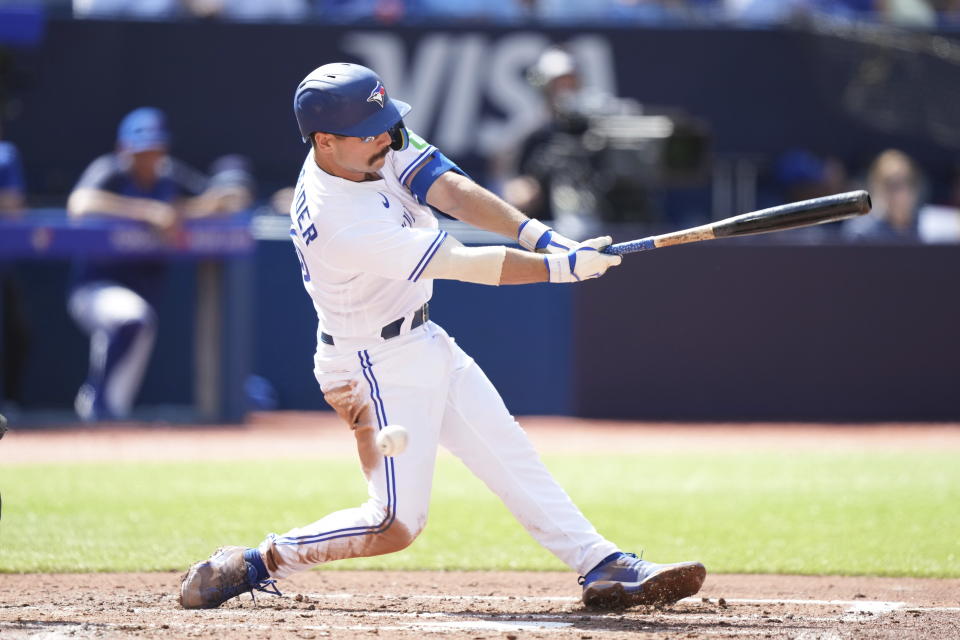 Toronto Blue Jays' Davis Schneider (36) swings though a pitch and strikes out against the Kansas City Royals during fourth inning American League baseball action in Toronto on Sunday, Sept. 10, 2023. (Nathan Denette/The Canadian Press via AP)