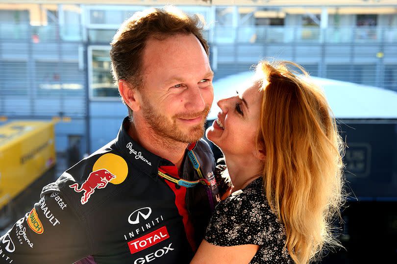 Geri seen here in a floral patterned dress in 2014 with her F1 beau Christian