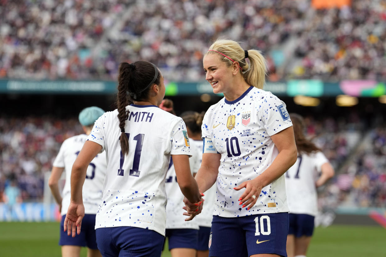 United States' Lindsey Horan (10) and Sophia Smith (11) celebrate after Horan scored their third goal during the second half of the Women's World Cup Group E soccer match between the United States and Vietnam at Eden Park in Auckland, New Zealand, Saturday, July 22, 2023. (AP Photo/Abbie Parr)