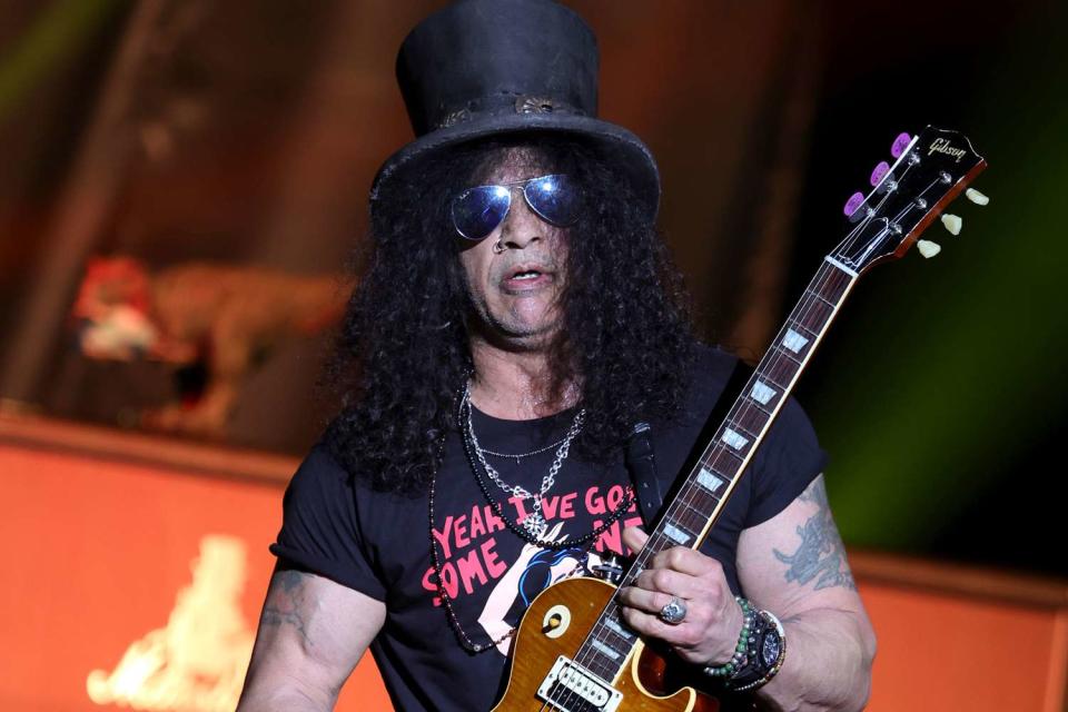 <p>Ethan Miller/Getty</p> Slash in Las Vegas on Feb. 19, 2022