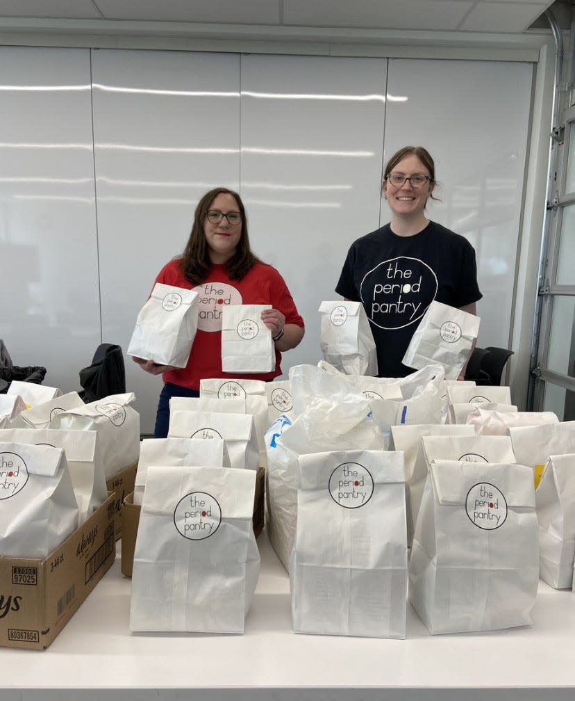 The Period Pantry Project's founder and board president Jill Guinan and executive director Melanie Saunders volunteered at a sorting and packing event, where they prepared packages of menstrual products for the community