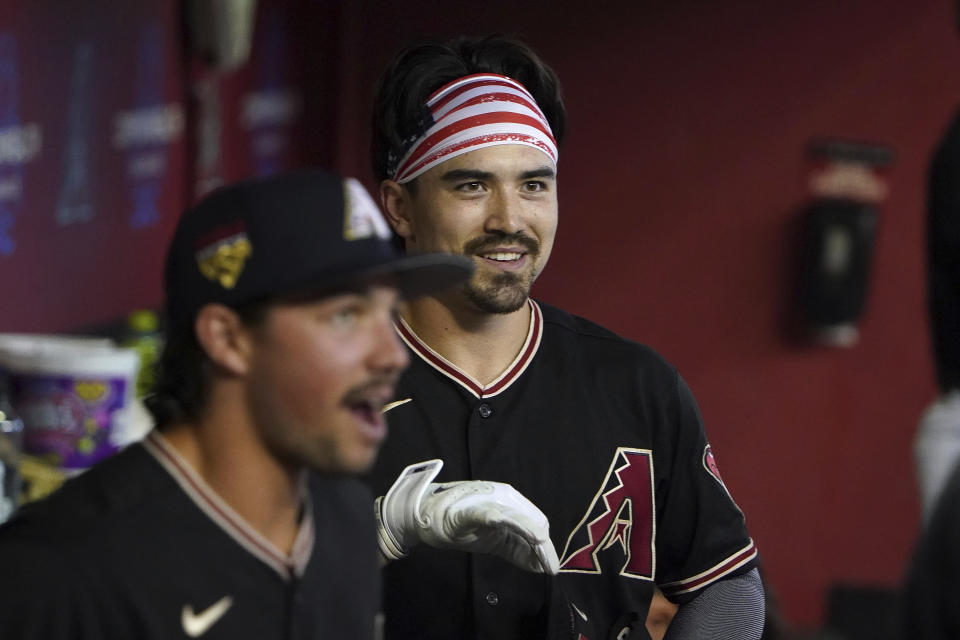 Arizona Diamondbacks' Corbin Carroll smiles after his home run against the New York Mets during the first inning of a baseball game Tuesday, July 4, 2023, in Phoenix. (AP Photo/Darryl Webb)