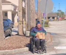 A man stationed himself outside the Walgreen's on Beville Road in Daytona Beach one day recently to solicit donations. The city's panhandling ordinance currently can't be enforced since a judge issued a temporary injunction on the local law in August.