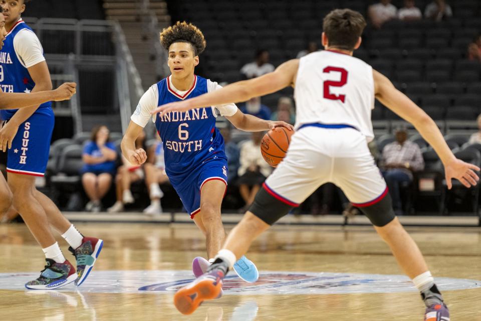 South Future All-Star Micah Davis (6), a junior from Franklin High School, drives toward the basket during the second half of an boysâ€™ Indiana High School Future All-Stars basketball game, Saturday, June 10, 2023, at Gainbridge Fieldhouse, in Indianapolis.