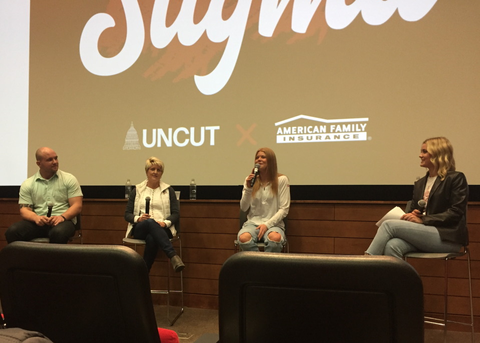 Wisconsin soccer player Emma Jaskaniec (right) speaks during a panel discussion on mental health in sports on Tuesday in Madison. Dr. Kris Eiring (left) also was part of the discussion, as were former football players Montee Ball and Chris Borland.