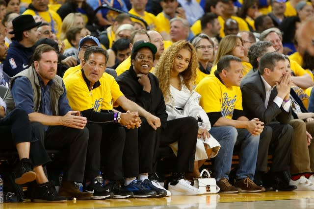 The two music superstars sat courtside for a NBA playoffs game on Saturday night.