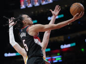 Portland Trail Blazers guard Dalano Banton (5) goes in for a basket against the Atlanta Hawks during the second half of an NBA basketball game Wednesday, March 27, 2024, in Atlanta. (AP Photo/John Bazemore)