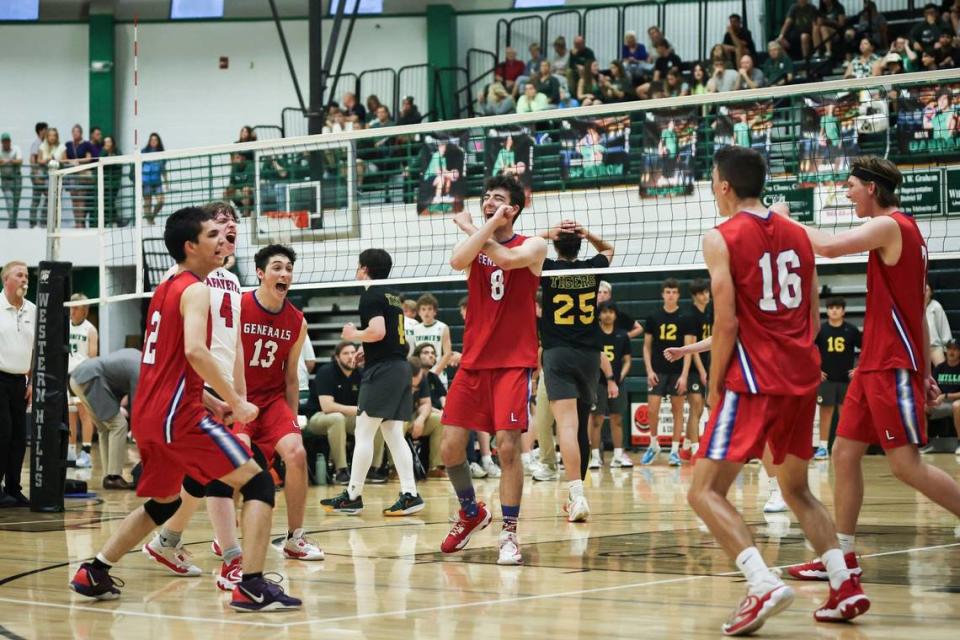 Lafayette celebrates scoring against St. Xavier during the KVCA boys volleyball semifinals at Western Hills High School in Frankfort on Thursday.