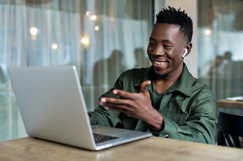 <span class="caption">Socialise, even if only online.</span> <span class="attribution"><a class="link " href="https://www.shutterstock.com/image-photo/handsome-african-american-man-using-computer-1576810201" rel="nofollow noopener" target="_blank" data-ylk="slk:Evgenyrychko/Shutterstock;elm:context_link;itc:0;sec:content-canvas">Evgenyrychko/Shutterstock</a></span>