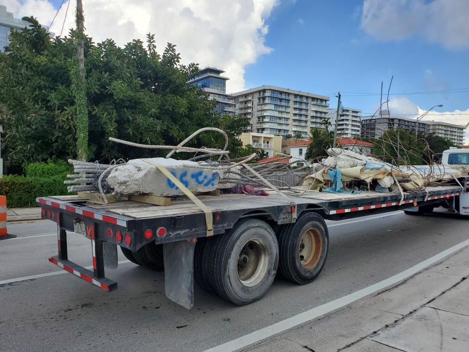 Surfside: Concrete, rebar and debris from Champlain Towers South marked and hauled away for evidence. July 11, 2021.