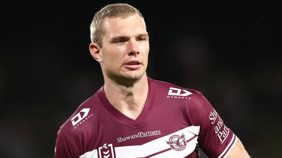 Pictured here, Manly fullback Tom Trbojevic looks on during an NRL match.