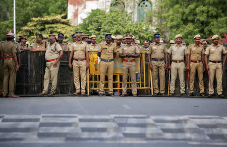 Policemen stand guard ahead of a protest, after at least 13 people were killed when police fired on protesters seeking closure of plant on environmental grounds in town of Thoothukudi in southern state of Tamil Nadu, in Chennai, India, May 24, 2018. REUTERS/P.Ravikumar
