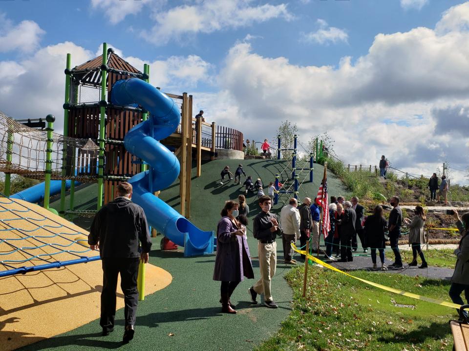 Area children wasted no time scaling Kids Mountain at the newly opened Lions Pride Park in Warrington Friday morning. The ADA-compliant park is a partnership between the township and the Warrington Lions Club.