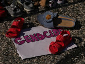 <p>A makeshift memorial has been set up in front of the Ontario Legislature in memory of the 215 children whose bodies were recently discovered on the grounds of a residential school in Kamloops, B.C. (Michael Charles Cole/CBC)</p> 